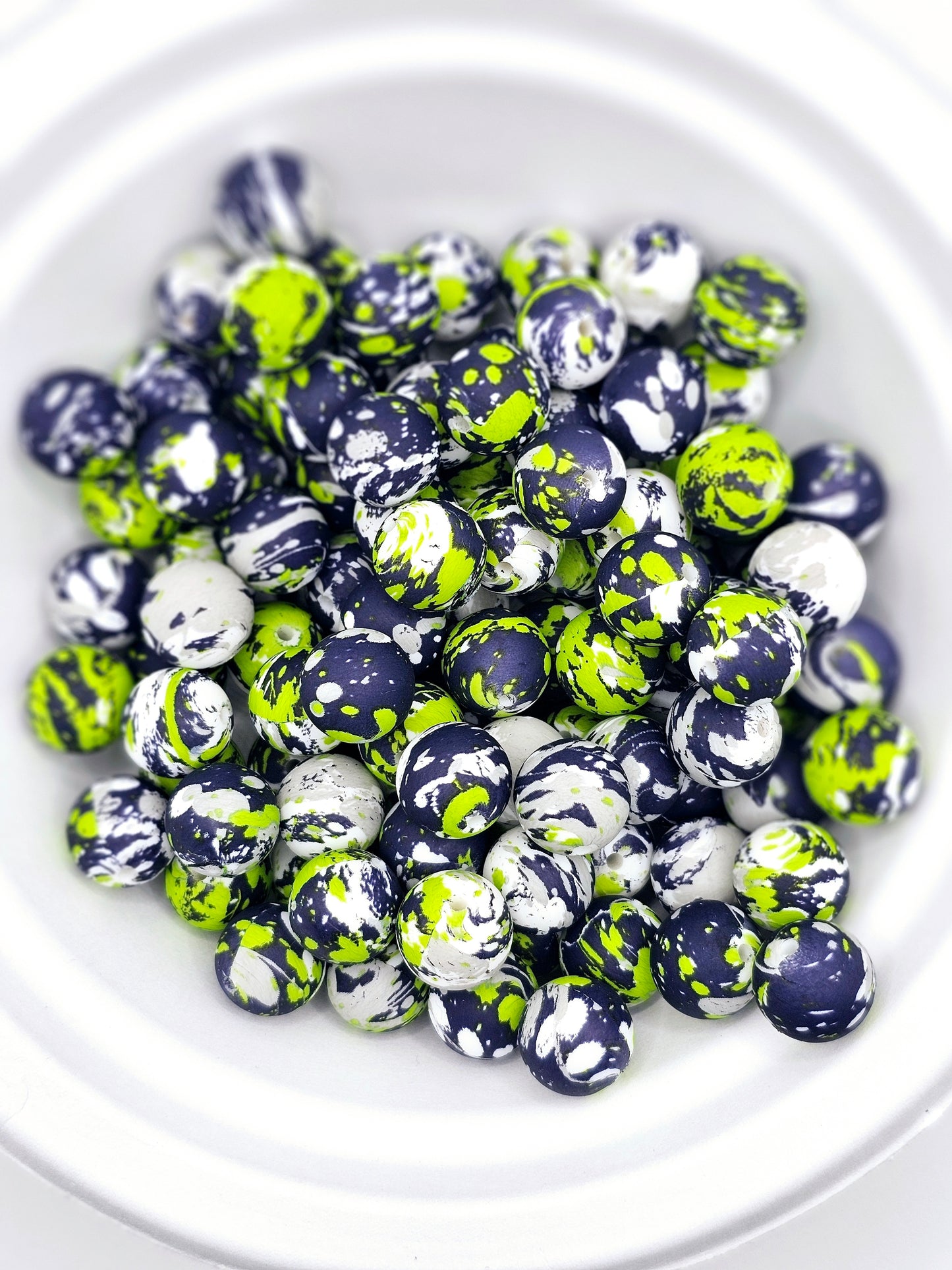 Green and navy paint splatter print 15mm silicone round bead