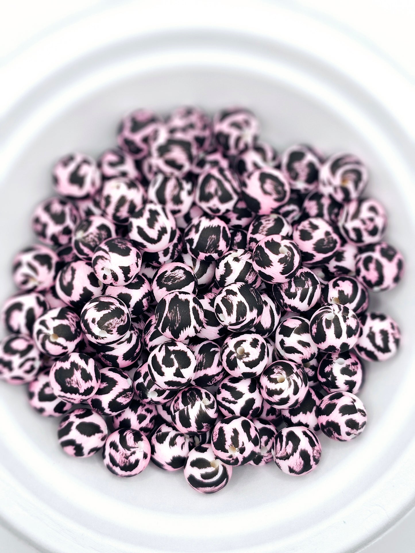 Light pink and black cheetah print 15mm silicone round bead
